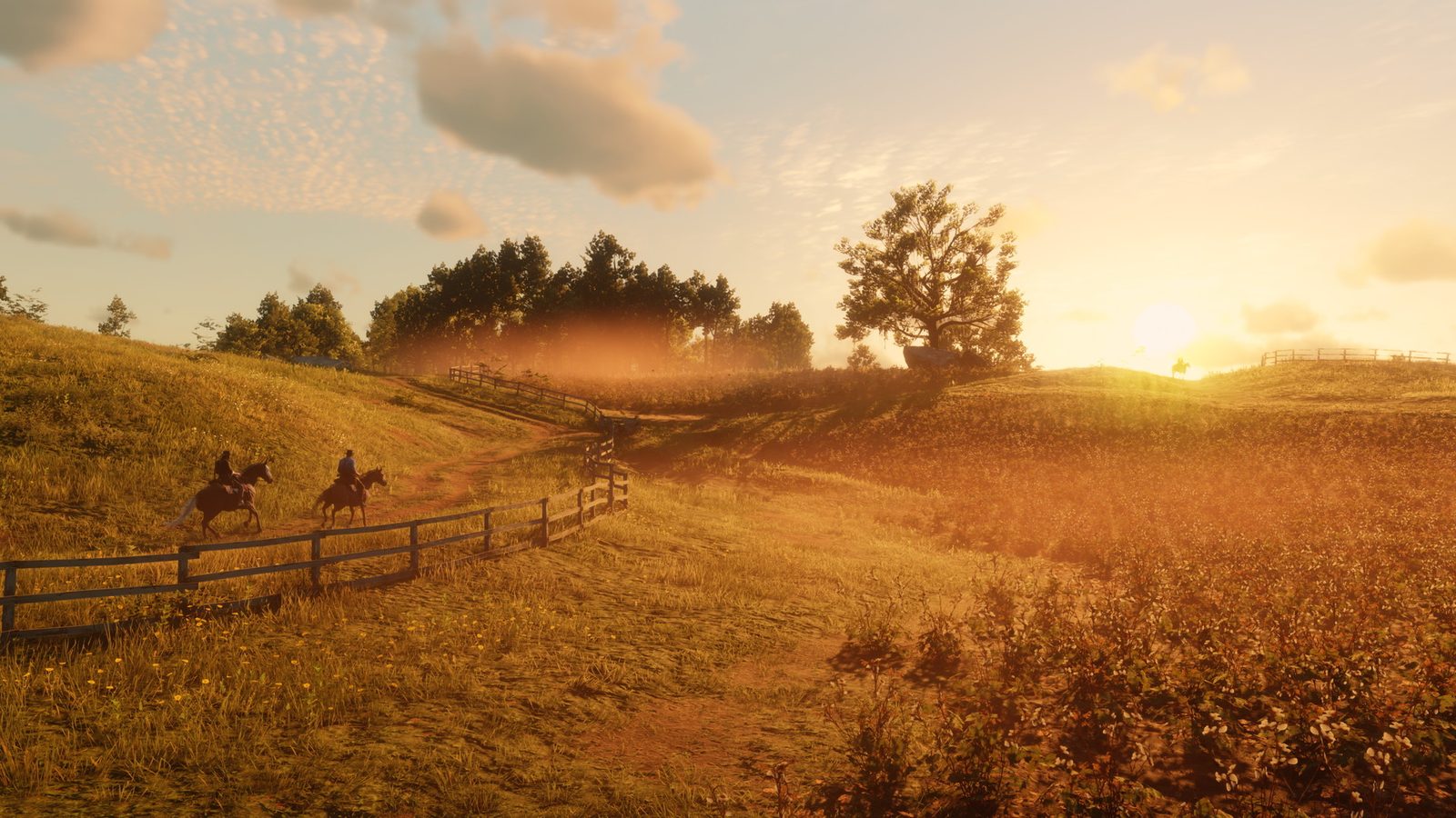 Two riders crossing golden fields at sunset in Red Dead Redemption 2
