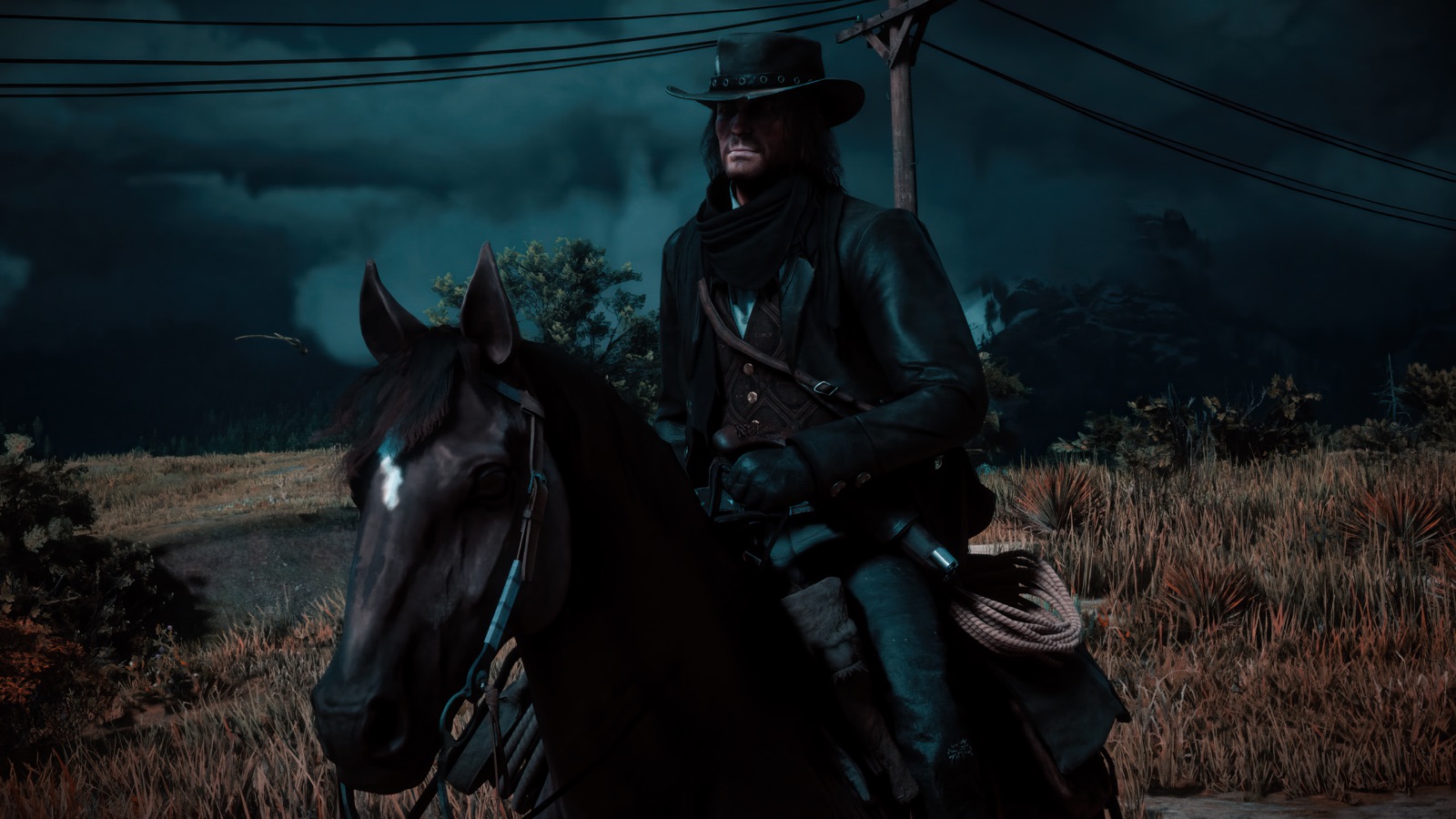 John Marston on horseback at dusk in Red Dead Redemption
