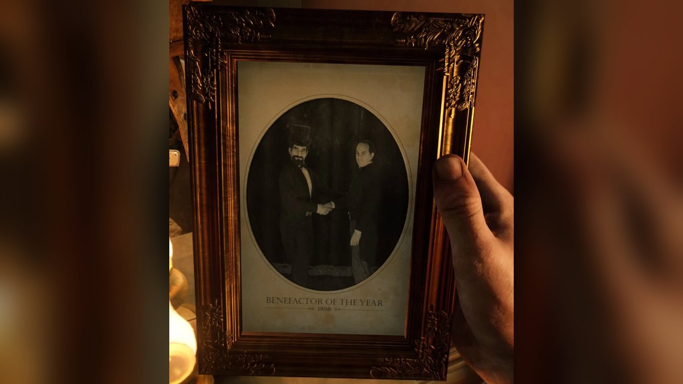 Framed photograph of two men shaking hands