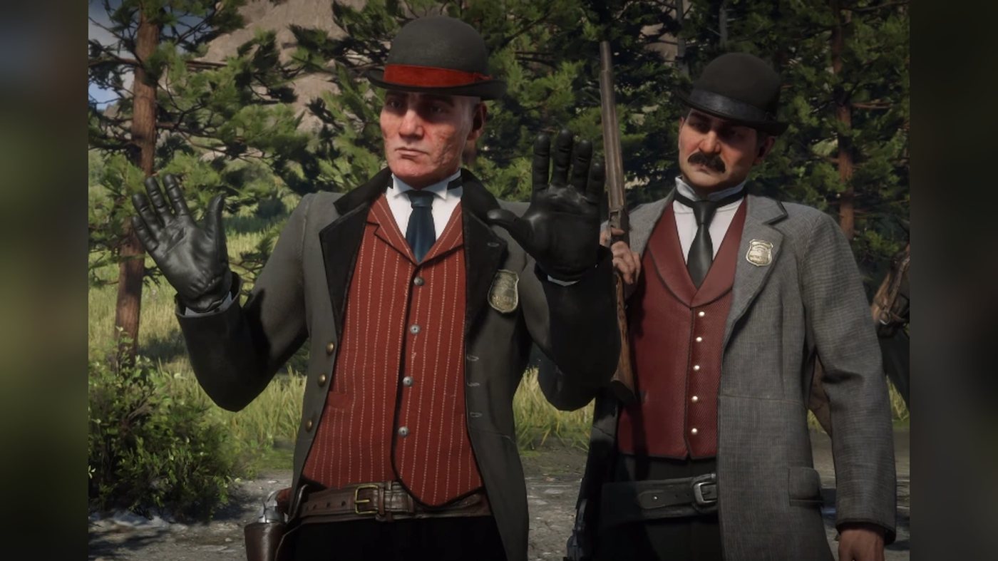 Two agents in bowler hats, one raising a hand