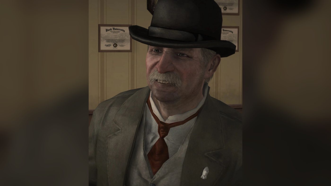 Ross in a bowler hat in an office