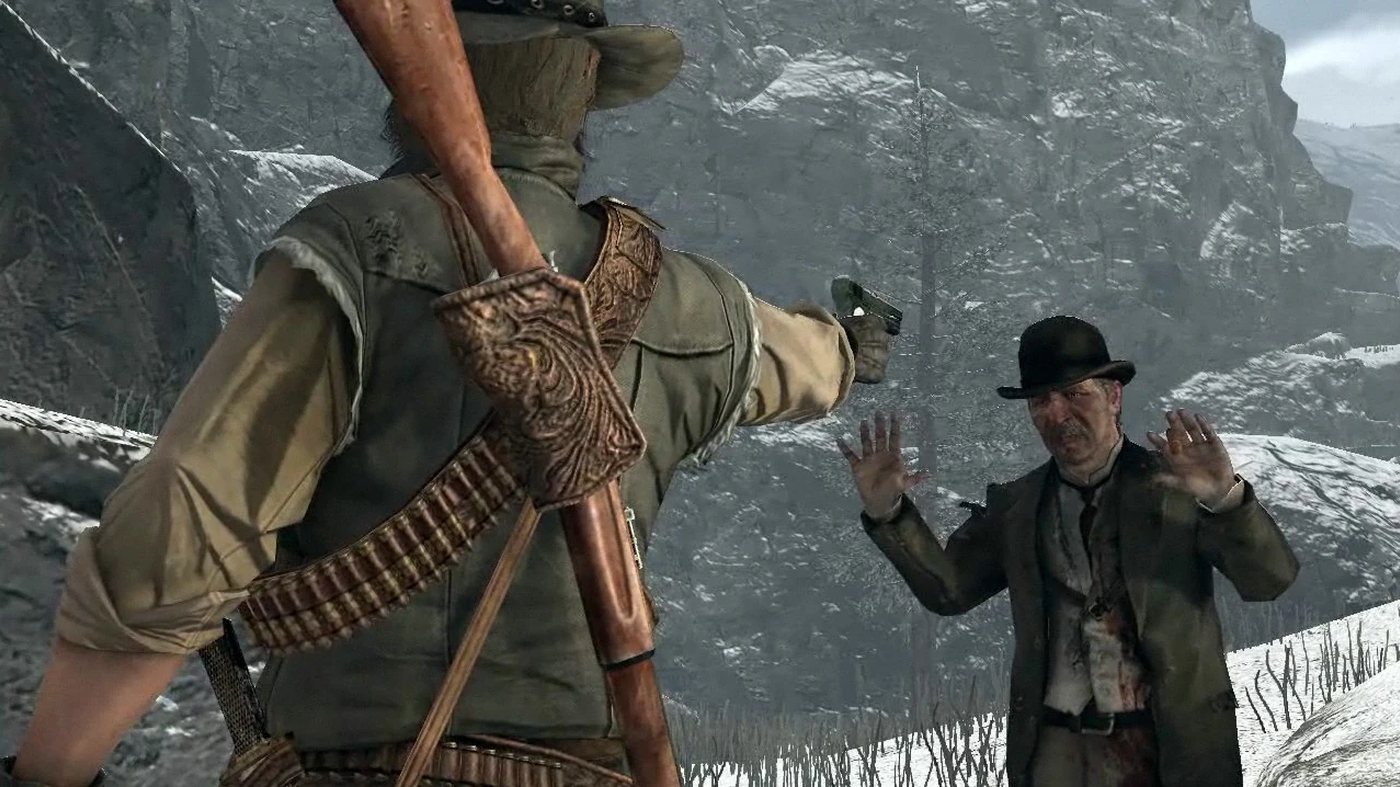 Ross raising his hands in the snow