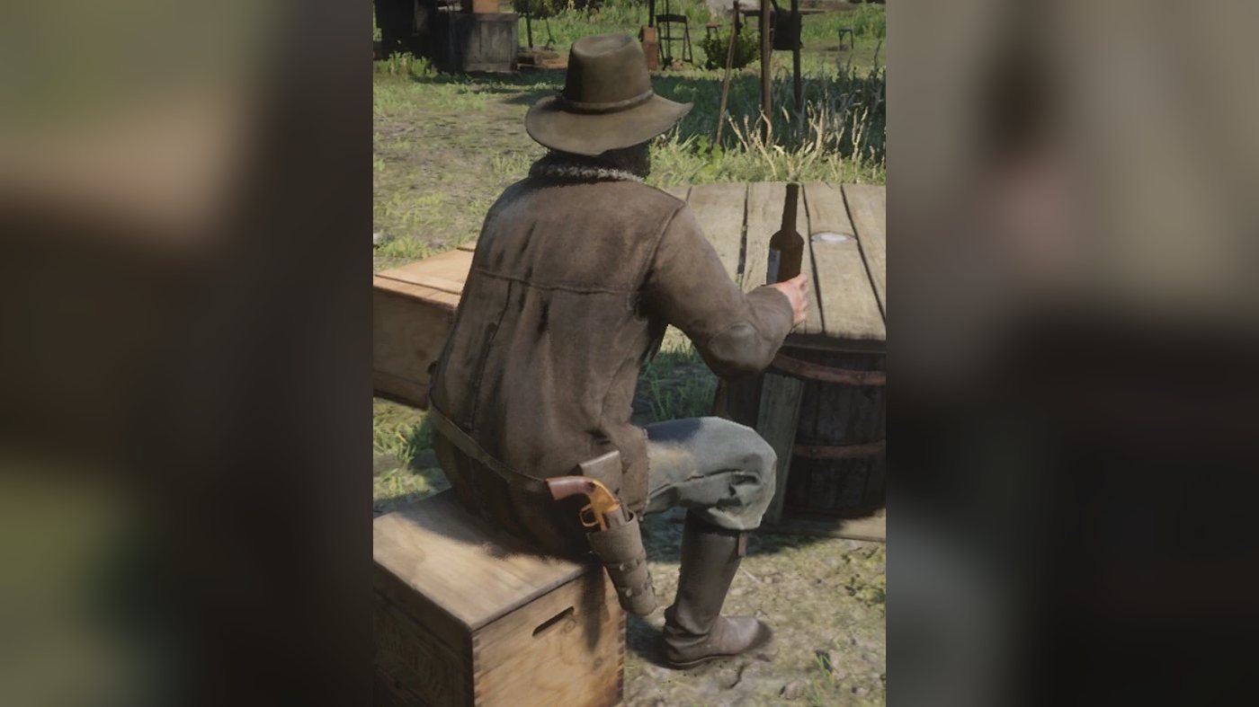 Uncle sitting on a crate with a bottle