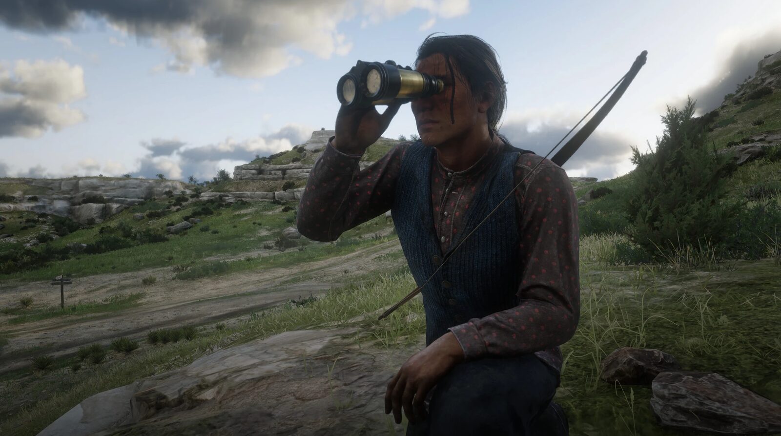 Eagle Flies scouting with a spyglass in the hills, in Red Dead Redemption 2